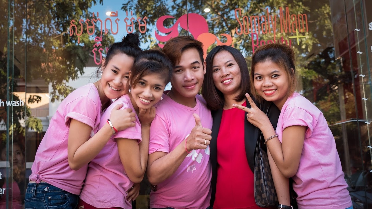 Members of the Beauty+ Team smiling and posing for a photo